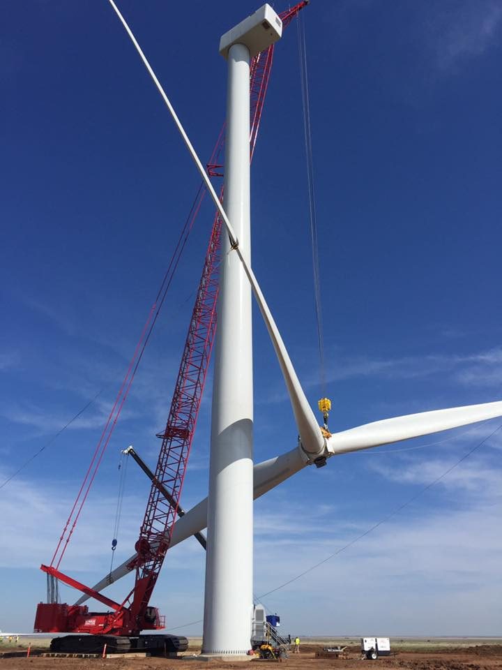 Utility-scale wind turbines at a project site
